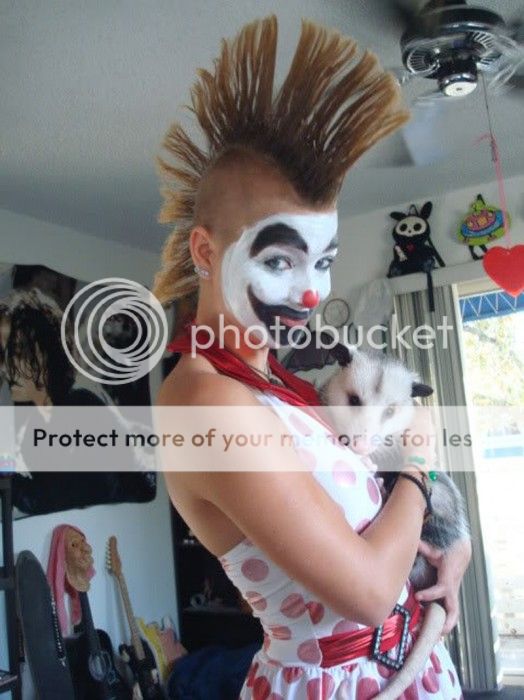 Sexy-Clown-With-Cat-524x700.jpg