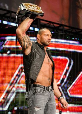 WWE-Batista-Showing-His-Belt.jpg